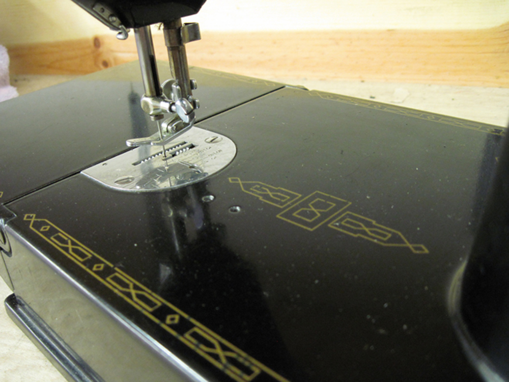 The needle bar, viewed from the right.