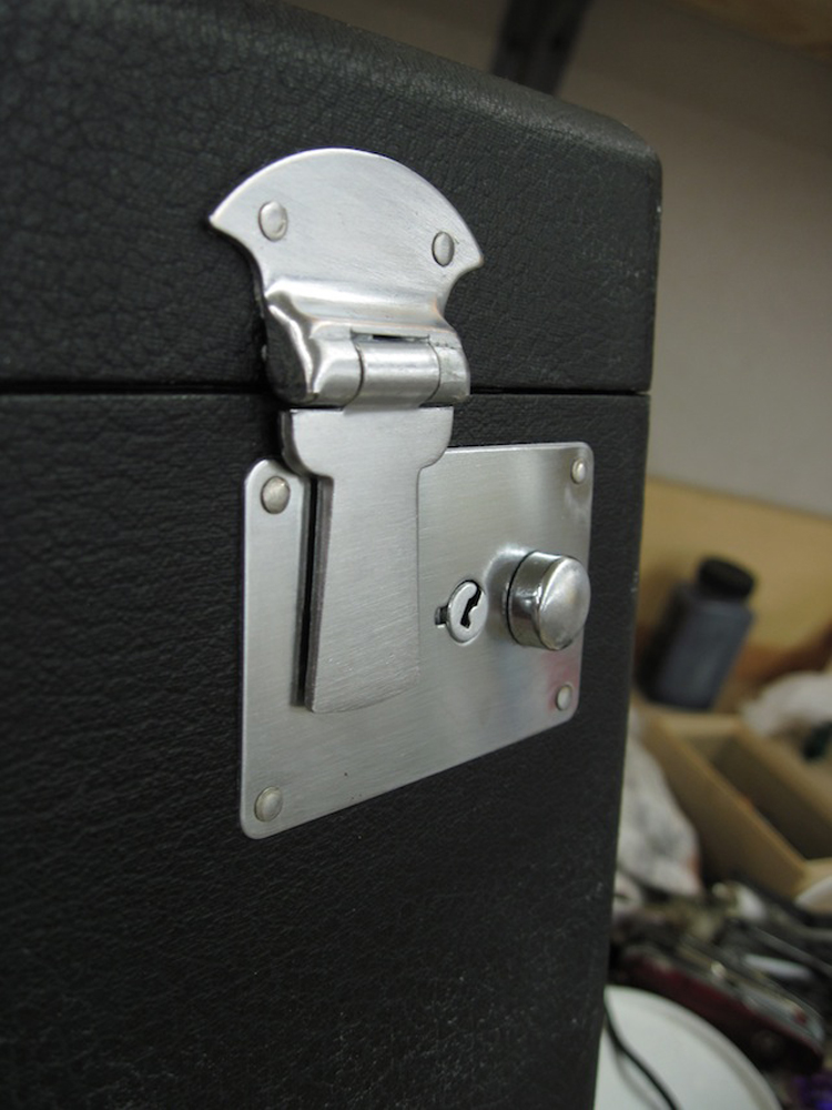 A close-up of the latch after restoration.