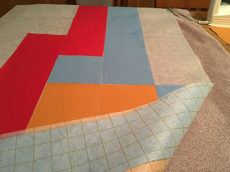 The front and back of the interfacing, with the one-inch grid clearly visible on the back.